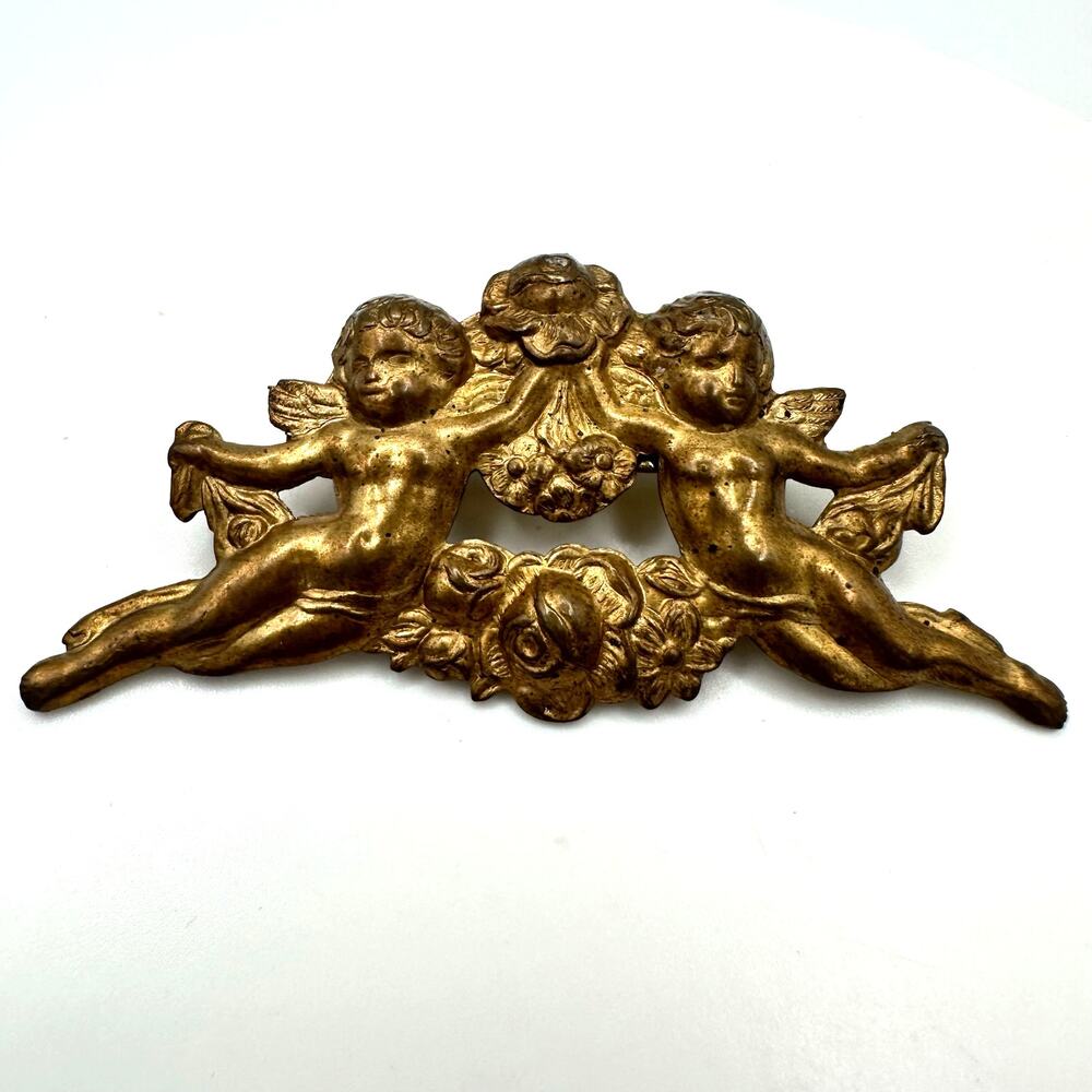 Vintage gold tone brass stamping Art Nouveau Revival cherubs roses floral brooch